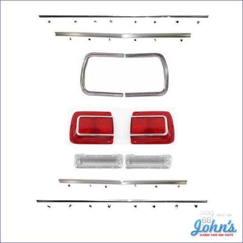 Rear Panel Molding And Bezel Kit With Tail Light Lenses Chrome. Includes Backup Lenses. (Os1) A